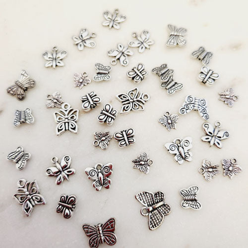 Butterfly Charm/Pendant/Crafting (assorted designs. silver metal)