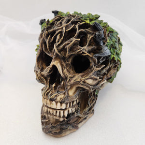 Skull with Bats and Leaves