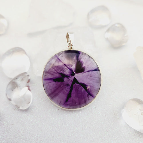 Amethyst Pendant (round. set in sterling silver)
