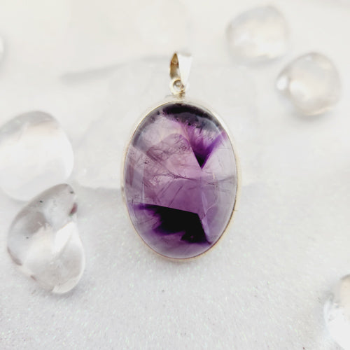 Amethyst Pendant (round. set in sterling silver)