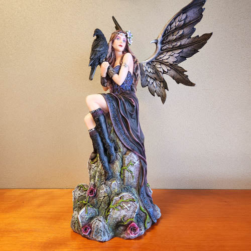 Fairy sitting with Crow (approx. 38 x 17 x 24cm)