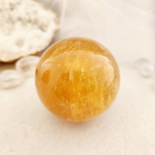 Golden Honey Calcite Sphere (approx. 6.2cm diameter)