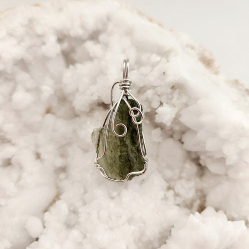 Moldavite Wrapped Pendant (silver metal. approx. 2.7gr total weight. cert. 1032)