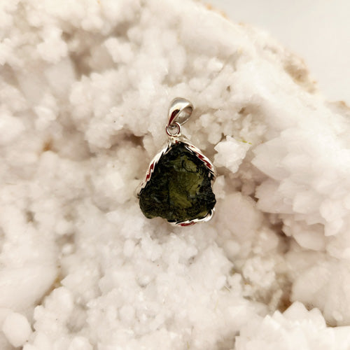 Moldavite Wrapped Pendant (sterling silver. approx. 3.5gr total weight. cert. 1034)