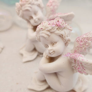 Sitting Cherub with Pink Sparkles