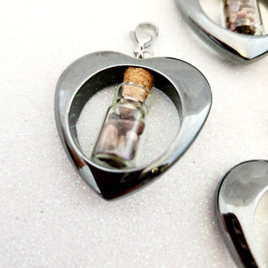 Synthetic Hematite Heart Pendant with Tiny Bottle of Crystals