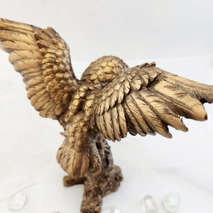 Bronze Look Owl Taking Flight