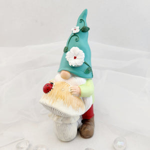 Garden Gnome Resting on Mushroom