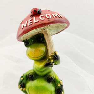 Frogs with Welcome Mushroom