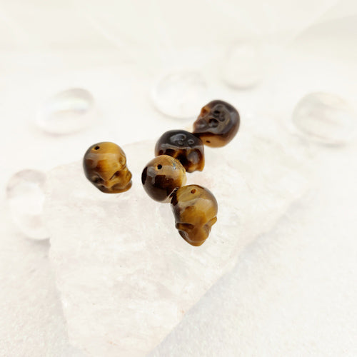 Gold Tiger's Eye Skull Bead (assorted. approx. 7x10mm)