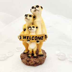 Meerkat Family with Welcome sign