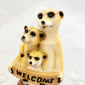Meerkat Family with Welcome sign