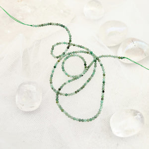 Emerald Faceted Tiny Bead Strand