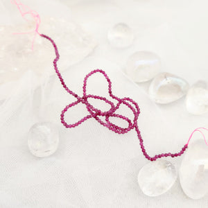 Ruby Faceted Tiny Bead Strand