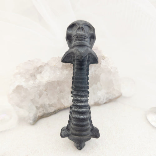 Black Obsidian Skull on Spine (approx. 10x3.2x3.5cm)