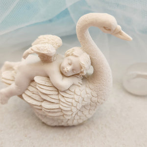 White Cherub Angel on Swan