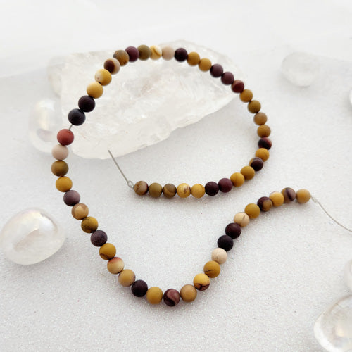 Mookaite Jasper Frosted Bead Strand (assorted. approx. 8mm round)