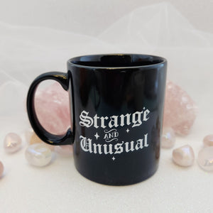 Strange and Unusual Mug