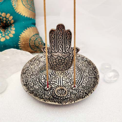 Hamsa Hand in Round Aluminium Incense Holder (approx. 8.5x6.5cm)