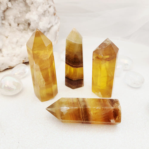 Gold & Purple Fluorite Polished Point (approx. 6-7x2.3x2.5cm)