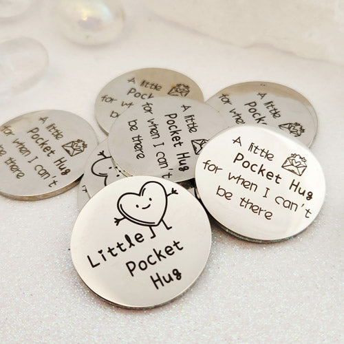 A Little Pocket Hug Token (double sided. stainless steel. approx. 3cm diameter)