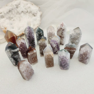 Amethyst and agate druzy point showing mixed purple tones and banding