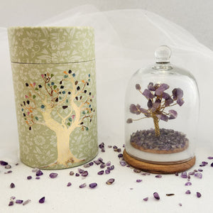 Amethyst crystal wish tree in a clear glass dome with gold wire branches.