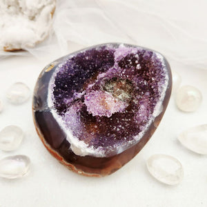 Amethyst druzy cluster with a polished agate rim and purple crystal centre
