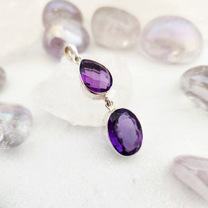Double amethyst faceted pendant with teardrop and oval stones in sterling silver bezel settings