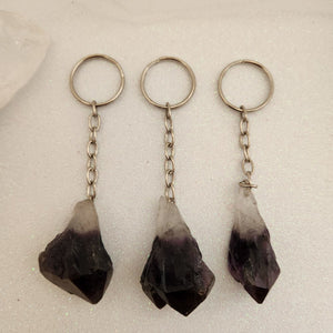 Amethyst natural point keyrings with deep purple tones and raw point shape.