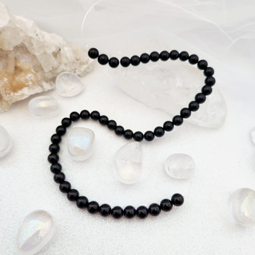 Black Obsidian Bead Strand (approx. 46-48 x 8mm beads)