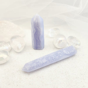 Blue Lace Agate polished point with soft blue and white banding