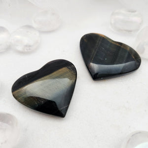 Polished blue tiger's eye hearts with golden-brown chatoyant bands