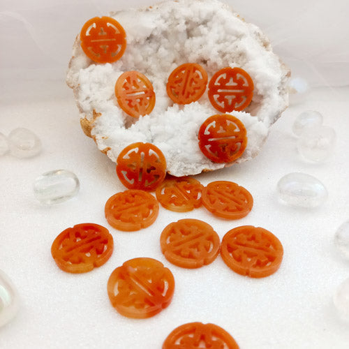 Calcite Carved Disc (approx. 2.9cm diameter)