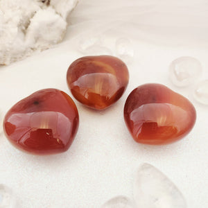Polished Carnelian Agate heart with rich orange tones and soft banding.