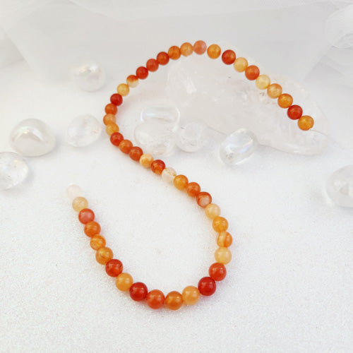 Carnelian Bead Strand (assorted. approx. 45-47x8mm beads)