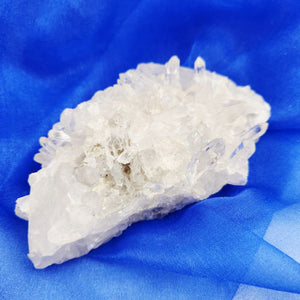 Clear Quartz crystal cluster with small, delicate points, promoting clarity and energy amplification
