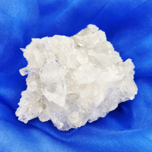Clear Quartz crystal cluster with small, delicate points, promoting clarity and energy amplification