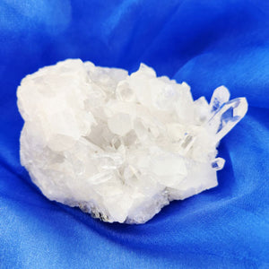 Clear Quartz crystal cluster with small, delicate points, promoting clarity and energy amplification