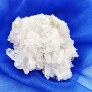 Clear Quartz crystal cluster with small, delicate points, promoting clarity and energy amplification