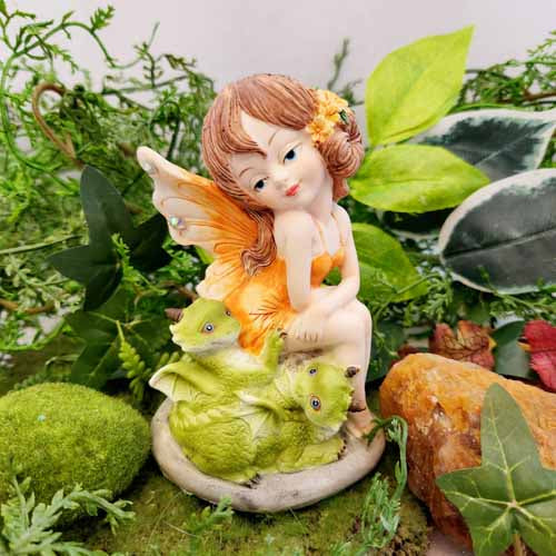 Cute Orange Fairy with Baby Dragons (approx. 12x8x8cm)