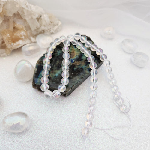 Electroplated aka Angel Aura Quartz Bead Strand (assorted. approx. 47-49 beads. round. 8mm)