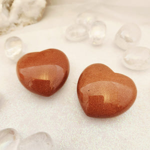 Polished Gold Sandstone heart with warm brown tone and fine shimmer.