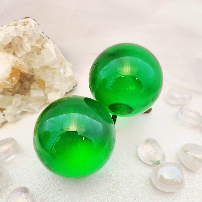 Green Obsidian Sphere (man-made. assorted. approx. 6-6.1cm diameter)