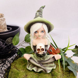 Green Witch Holding Skull