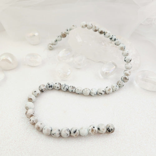 Kiwi/Sesame Jasper Frosted Bead Strand (assorted. approx. 45-47x8mm beads)