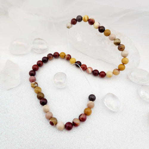 Mookaite Jasper Bead Strand (assorted. approx. 44-46x8mm beads)