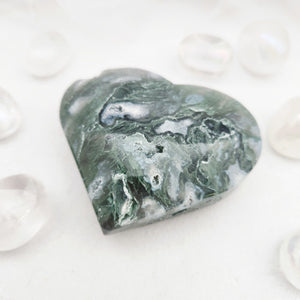 Polished moss agate heart with deep green and grey mottled patterns