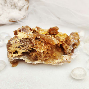 Raw Congo citrine cluster with radiating golden-brown crystal points