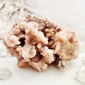 Pink amethyst cluster with a dense, botryoidal crystalline formation